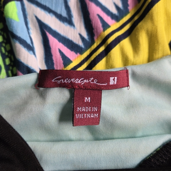 Vibrant Geometric Print Halter Cut Out Dress. - Picture 4 of 9